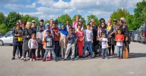 Gruppe von Pat:innen und Ihren Schützlingen